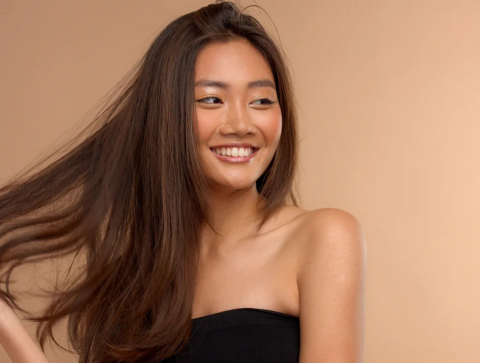 Asian Female closeup of smiling face.